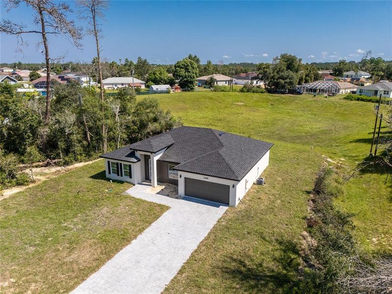 Front exterior of a new home in , Ocala, FL, highlighting curb appeal (Image 1).