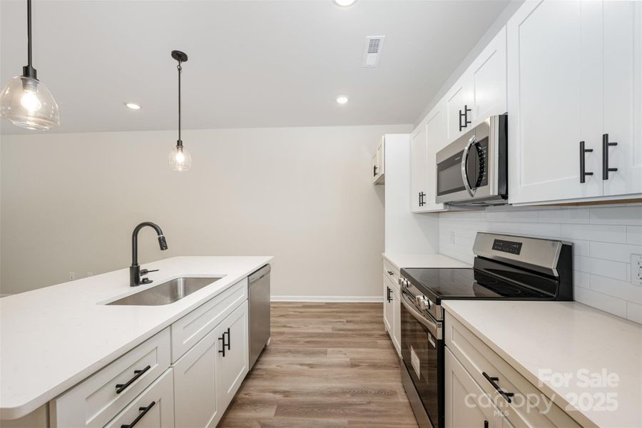 Furnished interior view inside a new home in , Charlotte (Image 9).