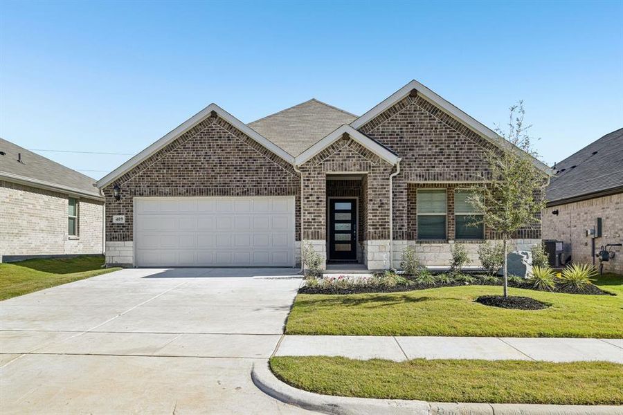 Front exterior of a new home in Westmoor, Sherman, TX, highlighting curb appeal (Image 2).