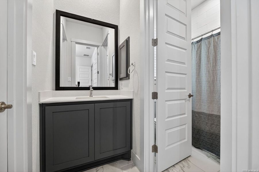 Furnished interior view inside a new home in Pradera Ridge, Floresville (Image 7).
