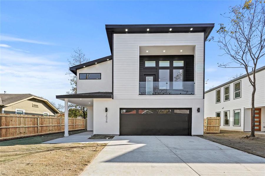 Modern home featuring a garage