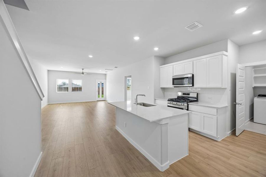 Open First Floor in the Mesquite home plan by Trophy Signature Homes – REPRESENTATIVE PHOTO