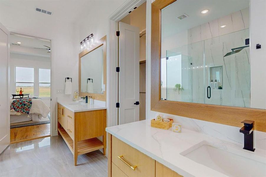 Main Bathroom with vanity, wood-type flooring, and a shower with shower door