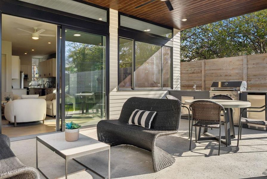 View of patio / terrace with ceiling fan and outdoor dining area
