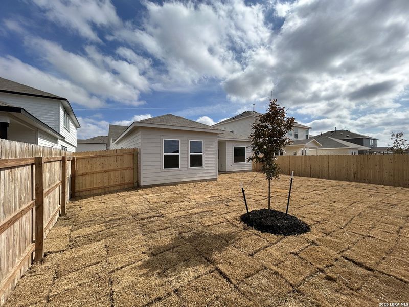 Exterior details and patio area of a home in Hennersby Hollow, San Antonio (Image 21).