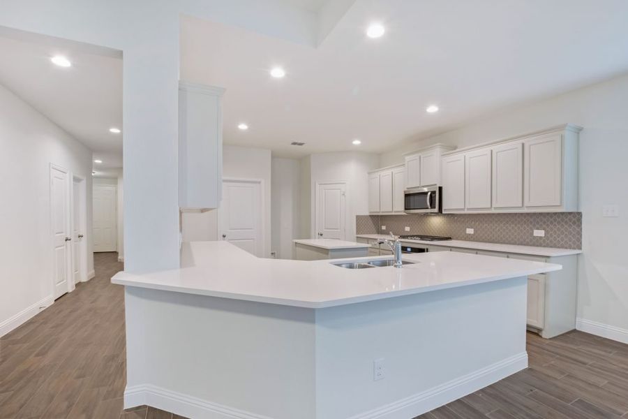 Representative exterior photo of a completed home built from the Preston by Impression Homes in Mercer Meadows, Royse City, TX (Image 7).