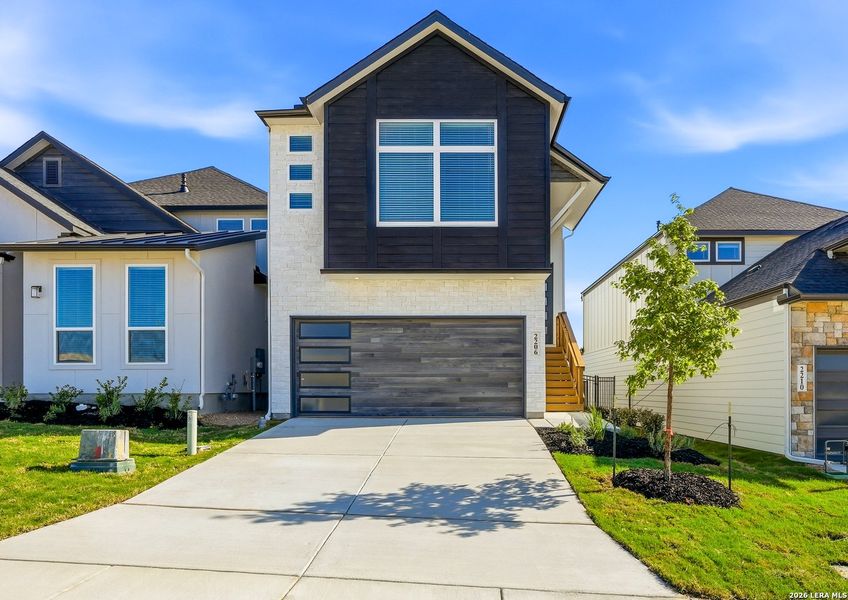 Front exterior of a new home in Prominence Urban, San Antonio, TX, highlighting curb appeal (Image 2). Front exterior of a new home in Prominence Urban, San Antonio, TX, highlighting curb appeal (Image 2).