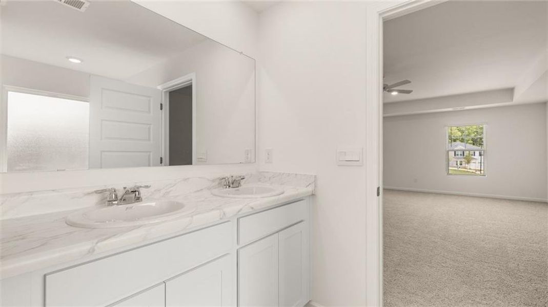 Furnished interior view inside a new home in Oakchase at Hampton, Hampton (Image 10).