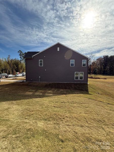 Side view of house and yard Side view of house and yard