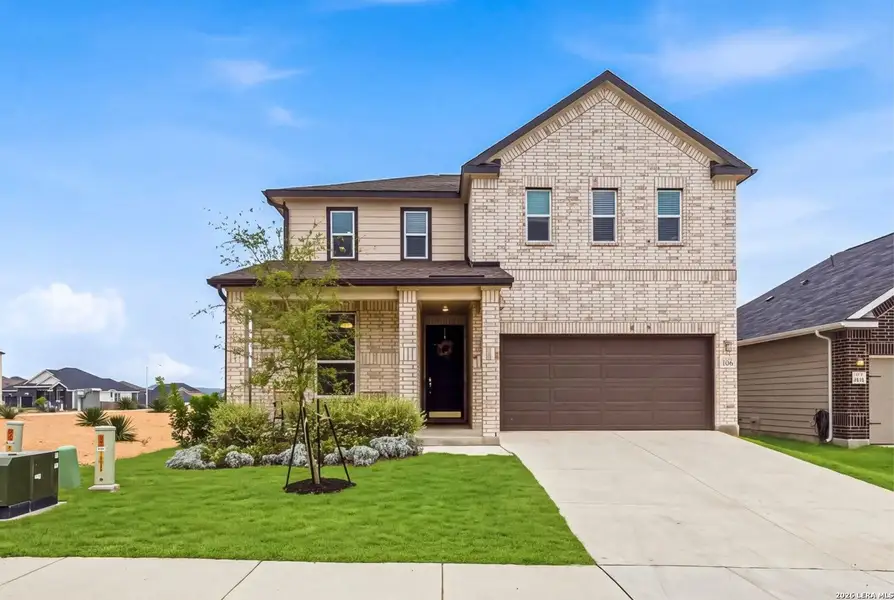 Front exterior of a new home in , Boerne, TX, highlighting curb appeal (Image 1). Front exterior of a new home in , Boerne, TX, highlighting curb appeal (Image 1).