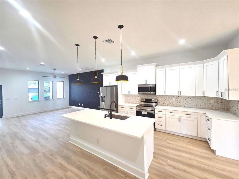 Furnished interior view inside a new home in , Port Charlotte (Image 3).