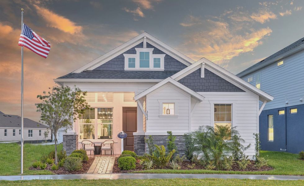 Front exterior of a new home in Persimmon Park, Wesley Chapel, FL, highlighting curb appeal (Image 1). Front exterior of a new home in Persimmon Park, Wesley Chapel, FL, highlighting curb appeal (Image 1).