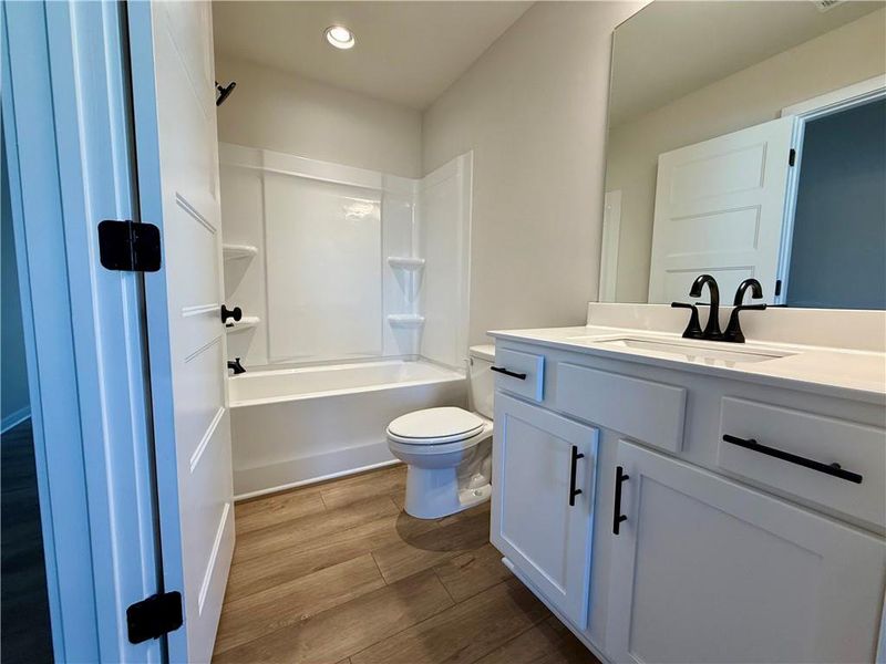 Furnished interior view inside a new home in Ponderosa Farms Manor, Gainesville (Image 15).