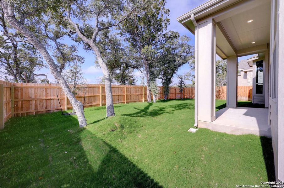 Exterior details and patio area of a home in Davis Ranch, San Antonio (Image 16).