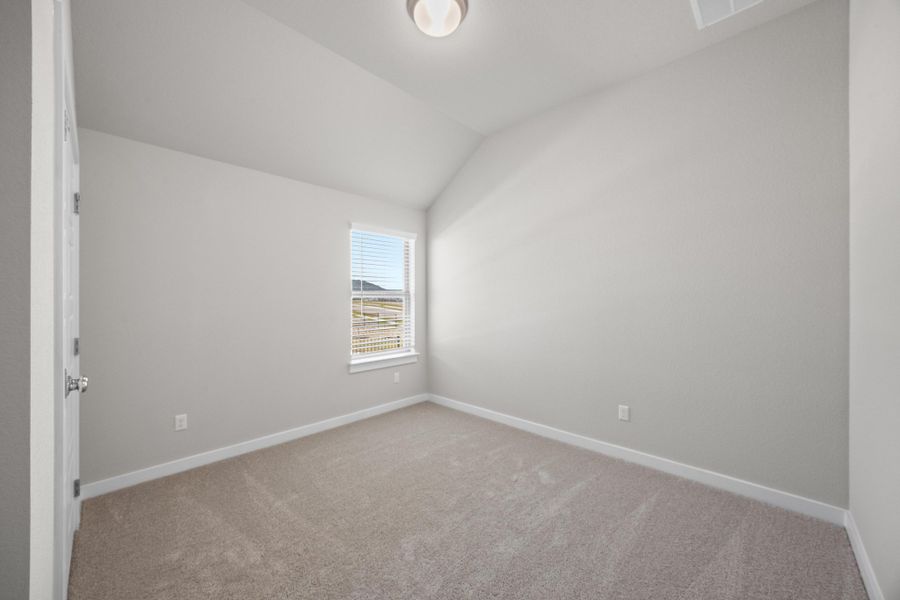 Bedroom in the Cypress home plan by Trophy Signature Homes - REPRESENTATIVE PHOTO Bedroom in the Cypress home plan by Trophy Signature Homes - REPRESENTATIVE PHOTO