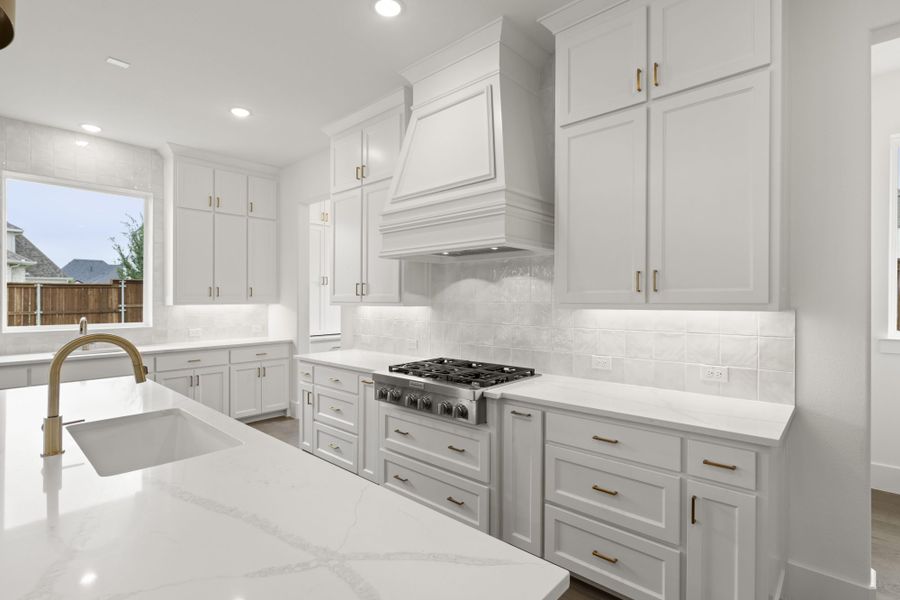 Representative furnished interior of a home built from the 7042 by Tradition Homes in Mustang Lakes, McKinney (Image 6).