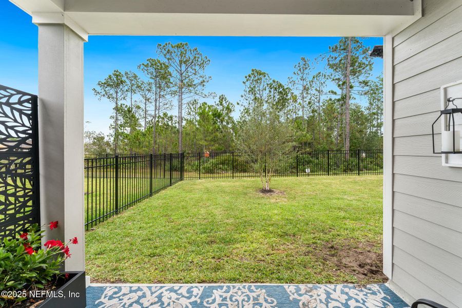 Exterior details and patio area of a home in Seminole Palms Single-Family Homes, Palm Coast (Image 29).
