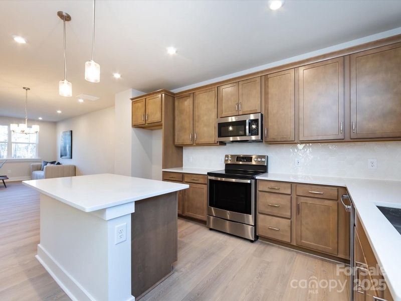 Quartz Countertops Across Kitchen and Island Quartz Countertops Across Kitchen and Island