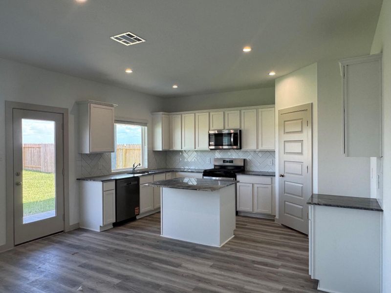 Furnished interior view inside a new home in Highland Village, Nome (Image 3).