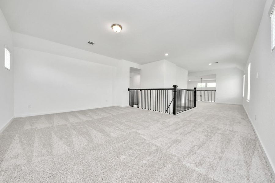 Discover a haven of leisure in this fantastic game room! Whether you're seeking a casual hangout or an adult gaming retreat, this space has it all. Enjoy the luxurious feel of plush carpet underfoot, the expansive ambiance of high ceilings, custom paint that adds a touch of personality, and windows that flood the room with refreshing natural light. Discover a haven of leisure in this fantastic game room! Whether you're seeking a casual hangout or an adult gaming retreat, this space has it all. Enjoy the luxurious feel of plush carpet underfoot, the expansive ambiance of high ceilings, custom paint that adds a touch of personality, and windows that flood the room with refreshing natural light.