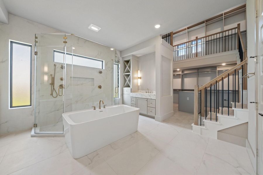 Showstopping two-story closet, an impressive space designed for maximum storage and style. Showstopping two-story closet, an impressive space designed for maximum storage and style.