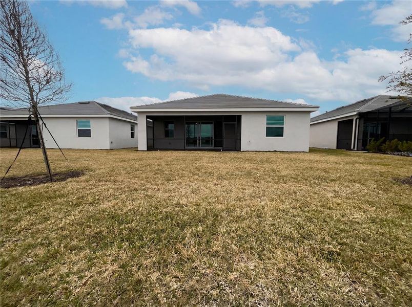 Exterior details and patio area of a home in Harbor East, Port Charlotte (Image 4).