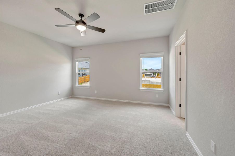 Spacious, unfurnished interior of a new home in Heritage, Dripping Springs (Image 23).