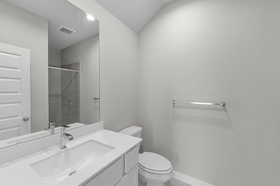 Furnished interior view inside a new home in Barton Creek Ranch, Conroe (Image 10).