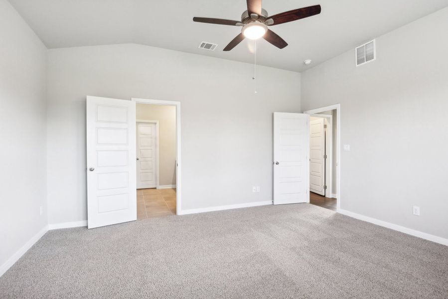 Primary suite in the Medina floorplan at a Meritage Homes community.