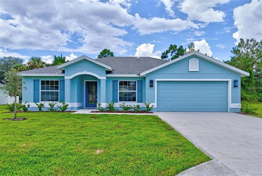 Front exterior of a new home in , Palm Coast, FL, highlighting curb appeal (Image 42).