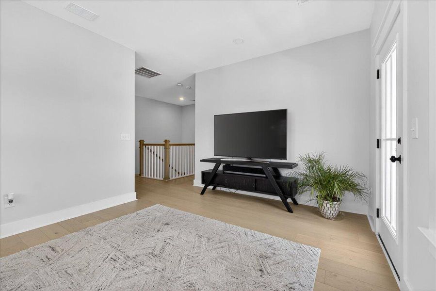 Furnished interior view inside a new home in Tidewater at Lakes of Cane Bay, Summerville (Image 43).