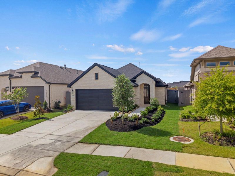 Front exterior of a new home in Jubilee, Hockley, TX, highlighting curb appeal (Image 2). Front exterior of a new home in Jubilee, Hockley, TX, highlighting curb appeal (Image 2).