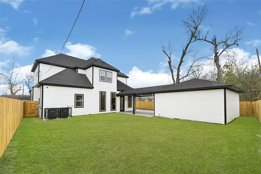 Even with all that luxurious square footage you still get a nice size backyard, detached two car garage and ample covered walkway Even with all that luxurious square footage you still get a nice size backyard, detached two car garage and ample covered walkway