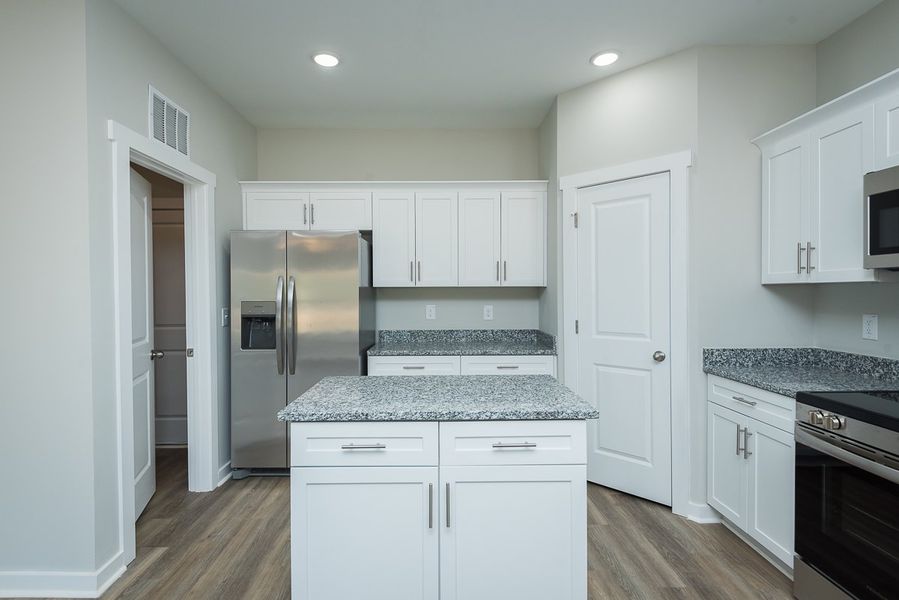 Representative furnished interior of a home built from the Brook C by Foundation Home Builders LLC in Pallini Place, Ossipee (Image 11).