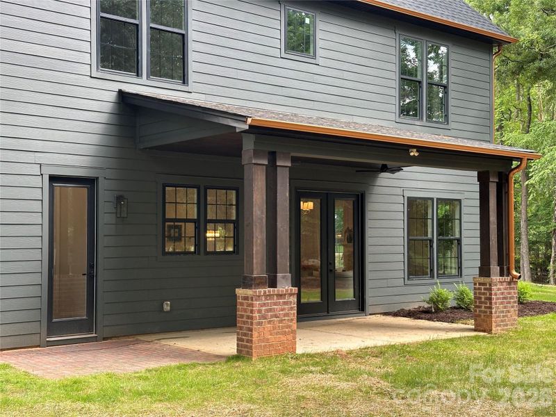 Exterior details and patio area of a home in , Matthews (Image 26).