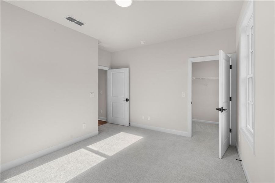 Spacious, unfurnished interior of a new home in Ward's Crossing Townhomes, Johns Creek (Image 36). Spacious, unfurnished interior of a new home in Ward's Crossing Townhomes, Johns Creek (Image 36).