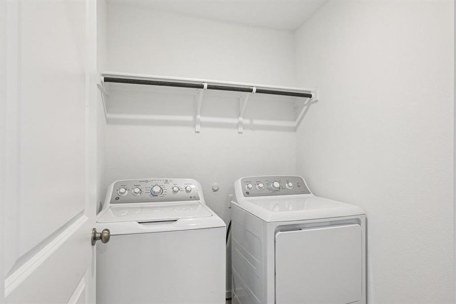 Laundry area with washer and clothes dryer Laundry area with washer and clothes dryer