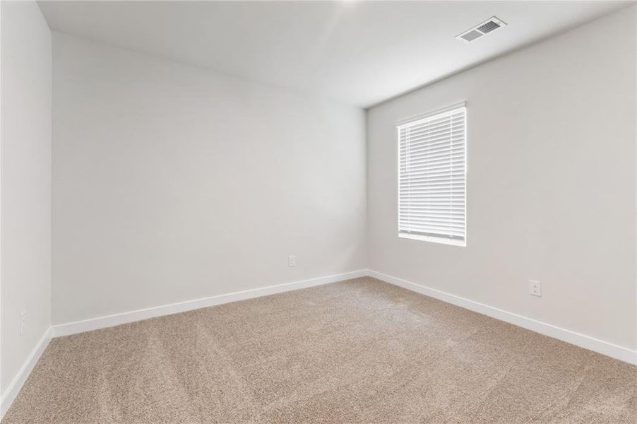 Spacious, unfurnished interior of a new home in Fern Dale, Fairburn (Image 14).
