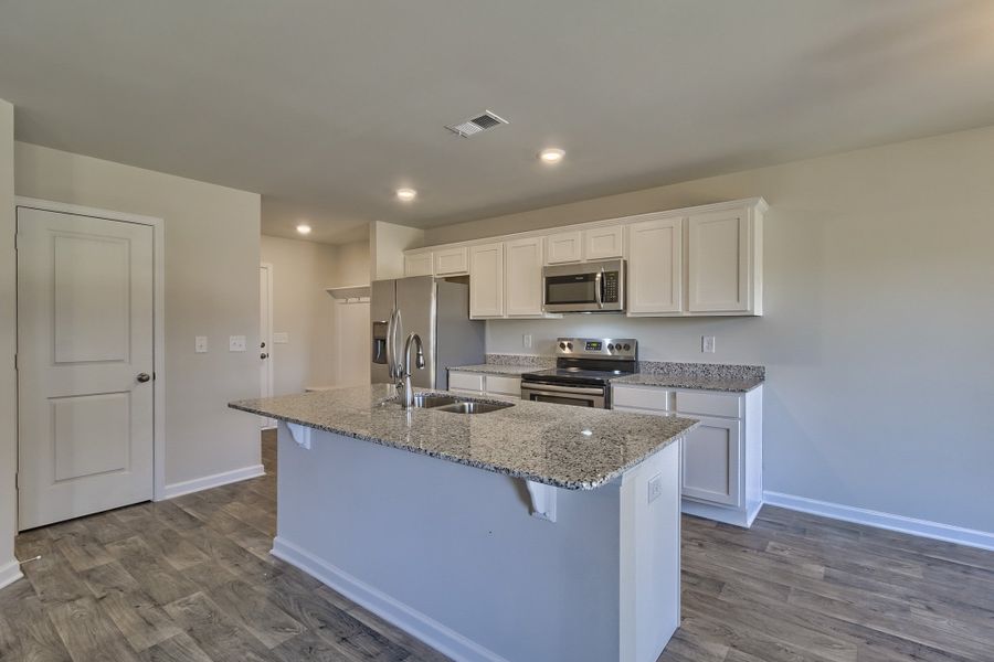 Representative furnished interior of a home built from the Cypress D - Nightingale Hills by McGuinn Homes in Nightingale Hills, Lexington (Image 11).