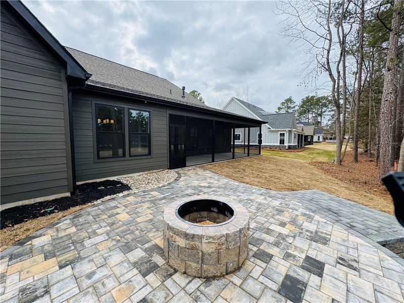 This residence features a patio with a built-in fi