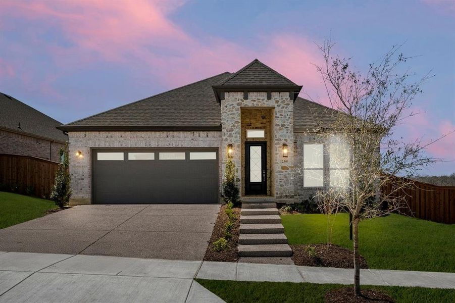 Front exterior of a new home in Inspiration, Lucas, TX, highlighting curb appeal (Image 21). Front exterior of a new home in Inspiration, Lucas, TX, highlighting curb appeal (Image 21).