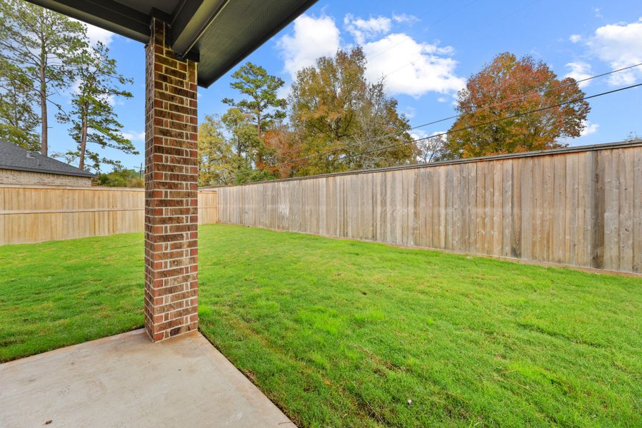 Exterior details and patio area of a home in The Woodlands Hills, Willis (Image 27). Exterior details and patio area of a home in The Woodlands Hills, Willis (Image 27).