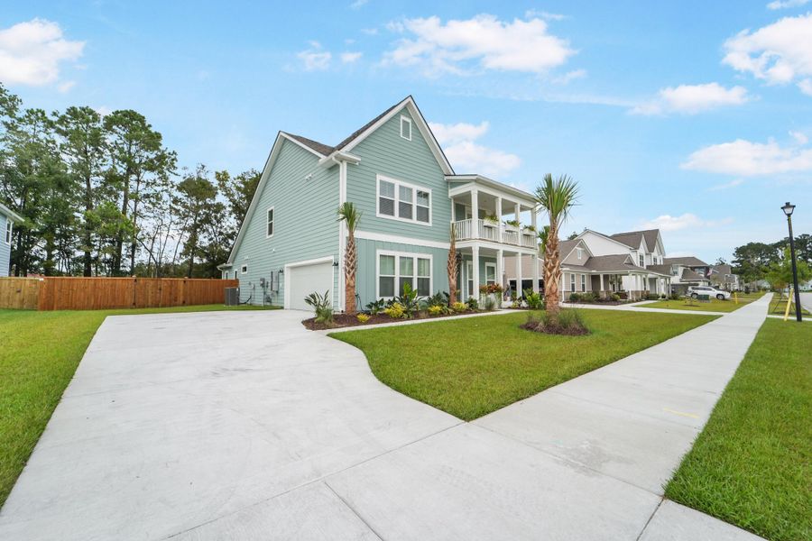 Front exterior of a new home in , Johns Island, SC, highlighting curb appeal (Image 30). Front exterior of a new home in , Johns Island, SC, highlighting curb appeal (Image 30).