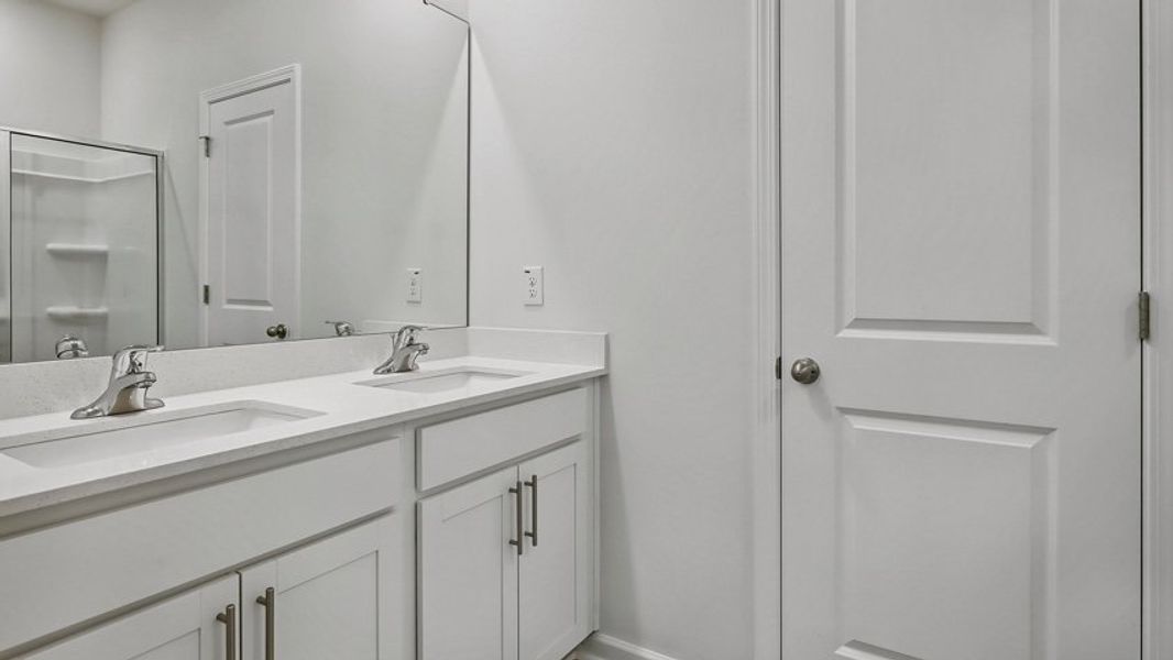 Representative furnished interior of a home built from the HADLEIGH by D.R. Horton in The Townes Park, Apex (Image 15).