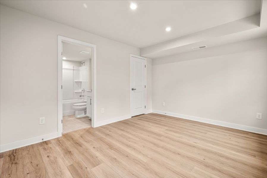 Spacious, unfurnished interior of a new home in Townes at The Station, Apex (Image 24).
