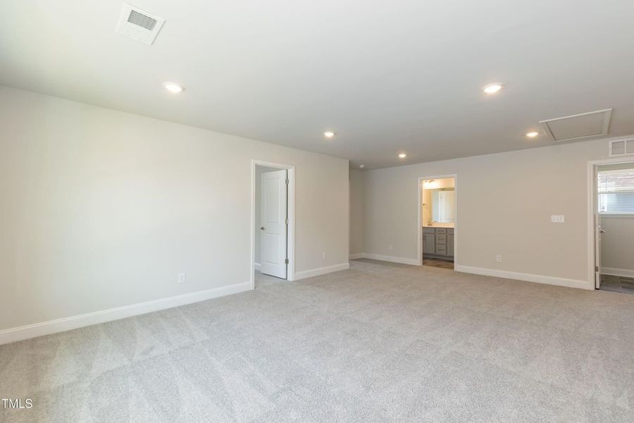 Representative unfurnished interior of a home built from the 2709 by Adams Homes in The Grove at Ballard, Jacksonville (Image 29).