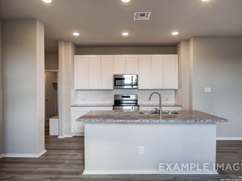Furnished interior view inside a new home in Agave, San Antonio (Image 5).