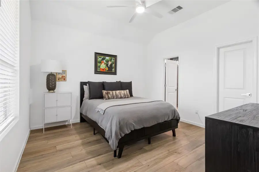 Fourth bedroom with ensuite and large walk-in closet perfect for multigenerational living