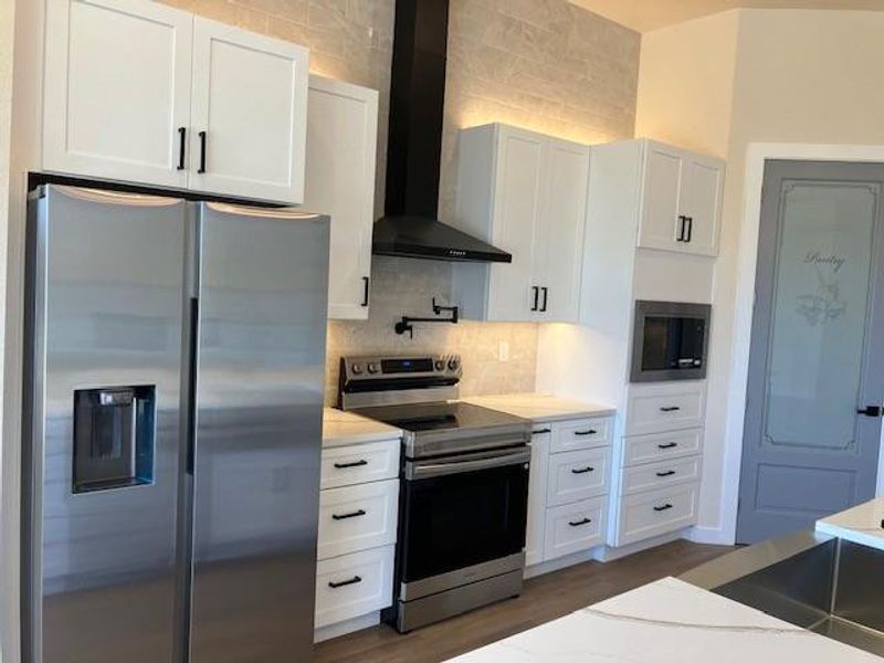 Furnished interior view inside a new home in , Whitney (Image 15).