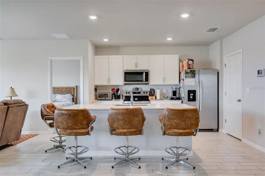 Furnished interior view inside a new home in Coral Bay - Express & Tradition, North Fort Myers (Image 6).